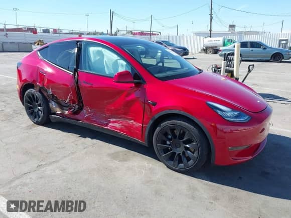 2022 Tesla Model Y Long Range z VIN 7SAYGDEE2NF352440, wystawiony jako IAAI lot #43041054 z przebiegiem 46 950 mil mil oraz . Historia ofert i sprzedaży dostępna na DreamBid. Obrazek 1.