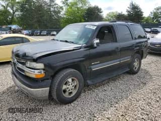 2003 Chevrolet Tahoe LT with VIN 1GNEC13Z23R145867, listed as a Copart auction lot 56762795 with 308,881 mi miles and Salvage title. Bid and sale history available at DreamBid. Image 1.