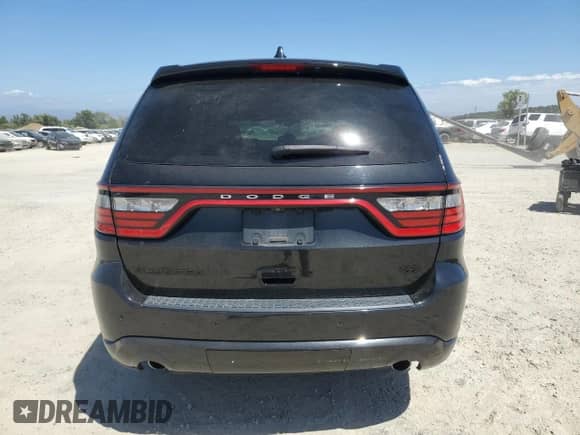 2015 Dodge Durango R/T with VIN 1C4SDHCT5FC766167, listed as a Copart auction lot 65834735 with 103,570 mi miles and Salvage title. Bid and sale history available at DreamBid. Image 6.