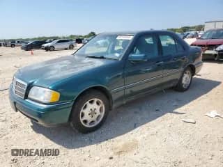 1996 Mercedes-Benz C с VIN WDBHA22E7TF440902, выставлен на аукционе Copart как лот 80149455 с пробегом 62 506 миль миль и Чистый • Clean title. История ставок и продаж доступна на DreamBid. Изображение 1.