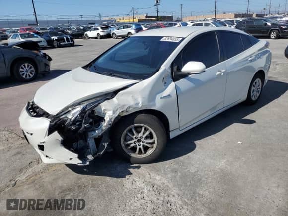 2016 Toyota Prius Two with VIN JTDKBRFU7G3505835, listed as a Copart auction lot 82694055 with 146,538 mi miles and Salvage title. Bid and sale history available at DreamBid. Image 1.