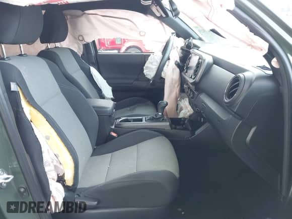 2022 Toyota Tacoma SR5 with VIN 3TMAZ5CN8NM180525, listed as a IAAI auction lot 42750259 with 52,414 mi miles and . Bid and sale history available at DreamBid. Image 5.
