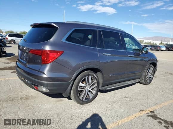 2017 Honda Pilot Touring с VIN 5FNYF5H96HB003659, выставлен на аукционе Copart как лот 86496755 с пробегом Не указан миль и Списание • Salvage title. История ставок и продаж доступна на DreamBid. Изображение 3.