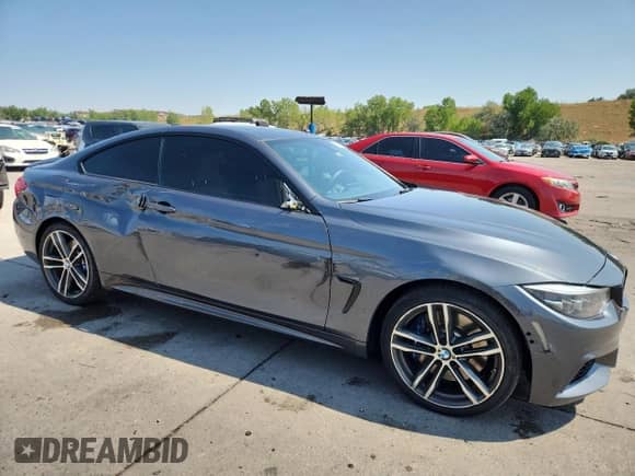 2019 BMW 4 Series 440i xDrive with VIN WBA4W9C55KAF94478, listed as a Copart auction lot 70665875 with 55,549 mi miles and Salvage title. Bid and sale history available at DreamBid. Image 4.
