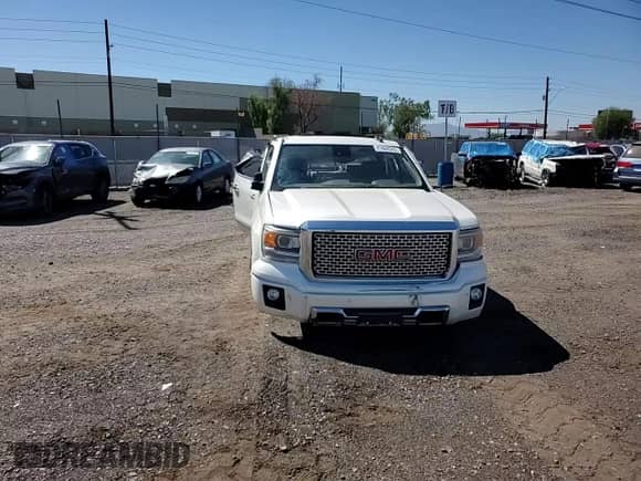 2015 GMC Sierra 1500 Denali z VIN 3GTU2WEC1FG320062, wystawiony jako Copart lot #81668345 z przebiegiem 132 850 mil mil oraz Szkoda całkowita • Salvage title. Historia ofert i sprzedaży dostępna na DreamBid. Obrazek 13.