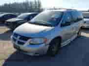 2003 Dodge Caravan EX with VIN 2D4GP74L83R157134, listed as a IAAI auction lot 41698861 with 155,818 mi miles and . Bid and sale history available at DreamBid. Image 2.