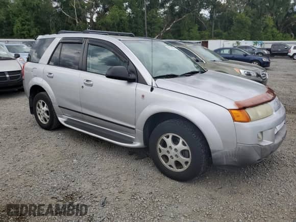 2004 Saturn VUE V6 with VIN 5GZCZ53474S845824, listed as a Copart auction lot 69186004 with 59,974 mi miles and Salvage title. Bid and sale history available at DreamBid. Image 4.