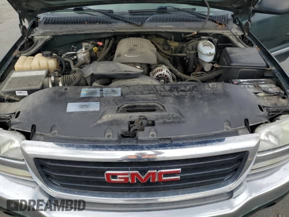 2004 GMC Sierra 1500 SLE z VIN 2GTEK19T541150960, wystawiony jako Copart lot #80576035 z przebiegiem 161 896 mil mil oraz Czysty tytuł • Clean title. Historia ofert i sprzedaży dostępna na DreamBid. Obrazek 11.
