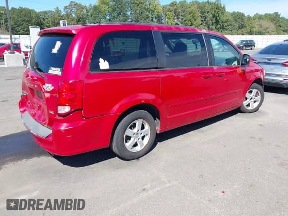 2012 Dodge Grand Caravan SXT with VIN 2C4RDGCG3CR203262, listed as a IAAI auction lot 43361783 with 195,957 mi miles and . Bid and sale history available at DreamBid. Image 4.