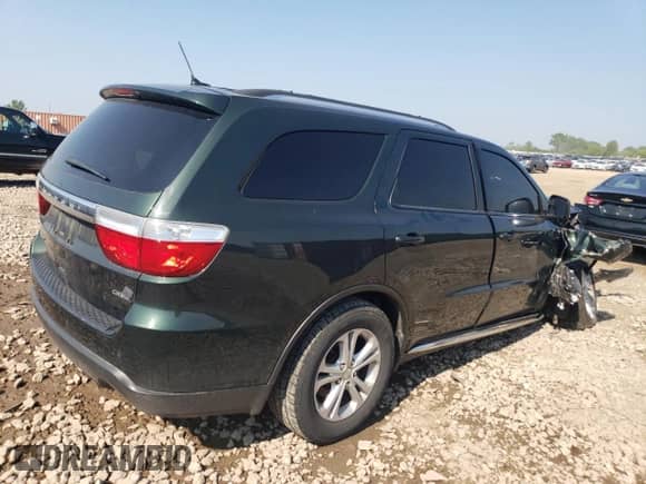 2011 Dodge Durango Crew with VIN 1D4RE4GG1BC653928, listed as a Copart auction lot 63946705 with 114,203 mi miles and Salvage title. Bid and sale history available at DreamBid. Image 3.