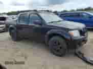 2010 Nissan Frontier Pro-4X with VIN 1N6AD0EV7AC417173, listed as a Copart auction lot 65851905 with 184,667 mi miles and Clean title. Bid and sale history available at DreamBid. Image 4.