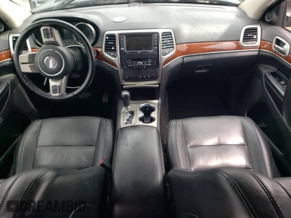 2012 Jeep Grand Cherokee Limited z VIN 1C4RJEBG4CC176984, wystawiony jako Copart lot #61396435 z przebiegiem 146 654 mil mil oraz Czysty tytuł • Clean title. Historia ofert i sprzedaży dostępna na DreamBid. Obrazek 8.