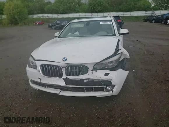 2012 BMW 7 Series 750i xDrive with VIN WBAKC6C54CC396671, listed as a Copart auction lot 55797715 with 90,446 mi miles and Salvage title. Bid and sale history available at DreamBid. Image 13.