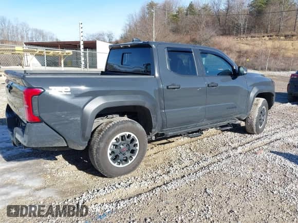 2024 Toyota Tacoma SR5 with VIN 3TYLB5JN6RT026356, listed as a IAAI auction lot 41432726 with 6,414 mi miles and . Bid and sale history available at DreamBid. Image 4.