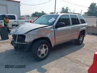 2005 Chevrolet TrailBlazer LT with VIN 1GNDS13SX52355663, listed as a IAAI auction lot 42886769 with 138,099 mi miles and . Bid and sale history available at DreamBid. Image 2.