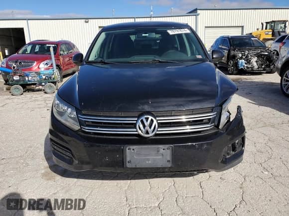 2014 Volkswagen Tiguan с VIN WVGCV3AXXEW604117, выставлен на аукционе Copart как лот 78791874 с пробегом 194 837 миль миль и Списание • Salvage title. История ставок и продаж доступна на DreamBid. Изображение 5.