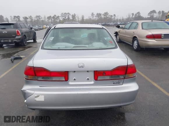 2002 Honda Accord VP with VIN 1HGCF86622A074850, listed as a IAAI auction lot 41815031 with 209,738 mi miles and . Bid and sale history available at DreamBid. Image 16.