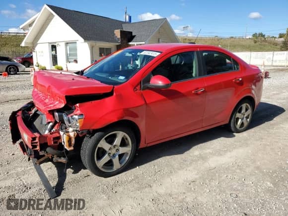 2015 Chevrolet Sonic LTZ with VIN 1G1JE5SB1F4201935, listed as a Copart auction lot 82342415 with 111,922 mi miles and Salvage title. Bid and sale history available at DreamBid. Image 1.