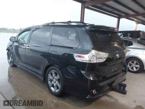 2014 Toyota Sienna SE with VIN 5TDXK3DC5ES456630, listed as a IAAI auction lot 42370657 with 164,633 mi miles and . Bid and sale history available at DreamBid. Image 3.