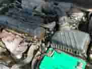 2004 Hyundai Tiburon with VIN KMHHM65D34U125669, listed as a IAAI auction lot 42320274 with 176,358 mi miles and . Bid and sale history available at DreamBid. Image 19.