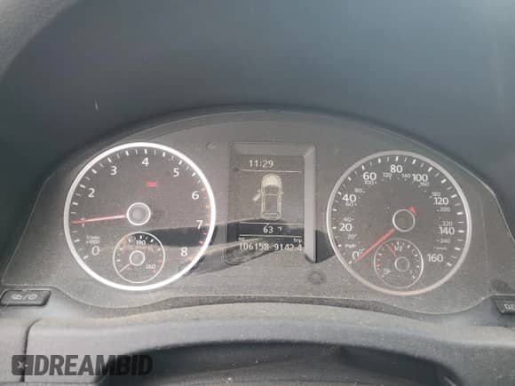 2014 Volkswagen Tiguan с VIN WVGCV3AX8EW609459, выставлен на аукционе Copart как лот 57623305 с пробегом 106 158 миль миль и Списание • Salvage title. История ставок и продаж доступна на DreamBid. Изображение 9.