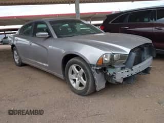 2014 Dodge Charger SE with VIN 2C3CDXBG9EH309140, listed as a IAAI auction lot 43261326 with 105,373 mi miles and . Bid and sale history available at DreamBid. Image 1.