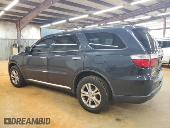 2013 Dodge Durango Crew with VIN 1C4RDJDG9DC682700, listed as a Copart auction lot 68078015 with 169,828 mi miles and Salvage title. Bid and sale history available at DreamBid. Image 2.