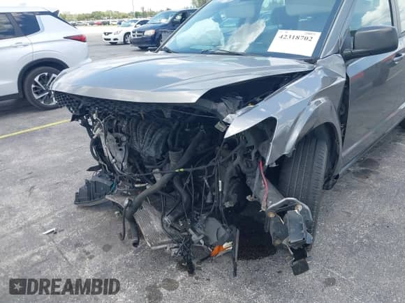 2013 Dodge Journey SE z VIN 3C4PDCAB3DT626929, wystawiony jako IAAI lot #42318702 z przebiegiem Nie podano mil oraz . Historia ofert i sprzedaży dostępna na DreamBid. Obrazek 14.