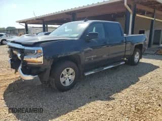 2018 Chevrolet Silverado 1500 LT with VIN 3GCUKREC7JG359703, listed as a Copart auction lot 69539785 with 243,935 mi miles and Salvage title. Bid and sale history available at DreamBid. Image 1.