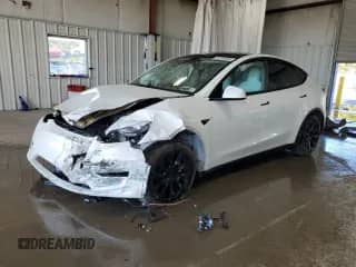 2020 Tesla Model Y Long Range с VIN 5YJYGDEE1LF037199, выставлен на аукционе Copart как лот 81200455 с пробегом Не указан миль и Списание • Salvage title. История ставок и продаж доступна на DreamBid. Изображение 1.