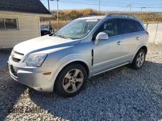 2014 Chevrolet Captiva Sport LTZ with VIN 3GNAL4EK4ES553397, listed as a Copart auction lot 90607835 with 112,636 mi miles and Clean title. Bid and sale history available at DreamBid. Image 1.