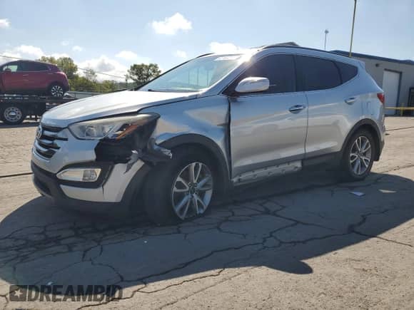 2015 Hyundai Santa Fe z VIN 5XYZU3LA3FG282803, wystawiony jako Copart lot #82160215 z przebiegiem 85 391 mil mil oraz Szkoda całkowita • Salvage title. Historia ofert i sprzedaży dostępna na DreamBid. Obrazek 1.