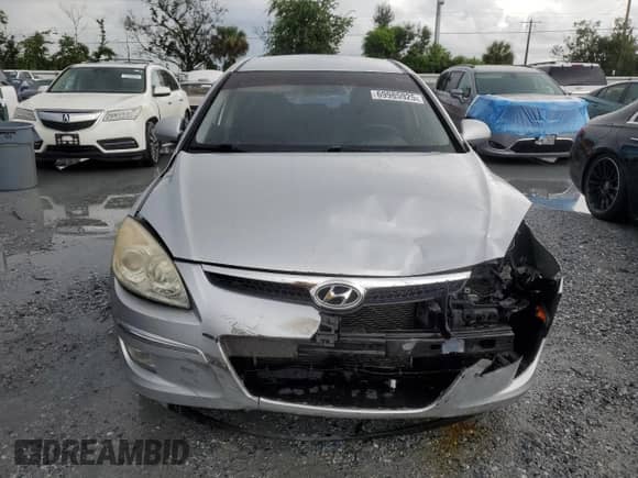 2009 Hyundai Elantra Touring с VIN KMHDC86E09U047279, выставлен на аукционе Copart как лот 69985925 с пробегом 97 796 миль миль и Списание • Salvage title. История ставок и продаж доступна на DreamBid. Изображение 5.