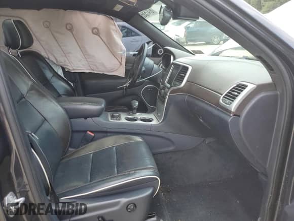 2015 Jeep Grand Cherokee Overland с VIN 1C4RJFCT0FC113614, выставлен на аукционе Copart как лот 67475365 с пробегом 122 094 миль миль и Списание • Salvage title. История ставок и продаж доступна на DreamBid. Изображение 7.