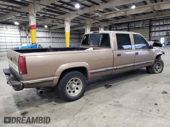 1995 Chevrolet Silverado 3500 с VIN 1GCHK33F2SF002296, выставлен на аукционе Copart как лот 81612483 с пробегом 269 032 миль миль и Списание • Salvage title. История ставок и продаж доступна на DreamBid. Изображение 3.
