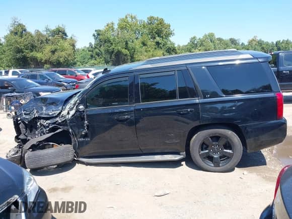 2018 Chevrolet Tahoe LT z VIN 1GNSKBKC9JR202765, wystawiony jako IAAI lot #43149820 z przebiegiem 79 113 mil mil oraz . Historia ofert i sprzedaży dostępna na DreamBid. Obrazek 14.
