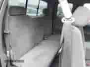 2002 Toyota Tundra SR5 z VIN 5TBRT34122S270133, wystawiony jako IAAI lot #43419031 z przebiegiem 104 846 mil mil oraz . Historia ofert i sprzedaży dostępna na DreamBid. Obrazek 8.