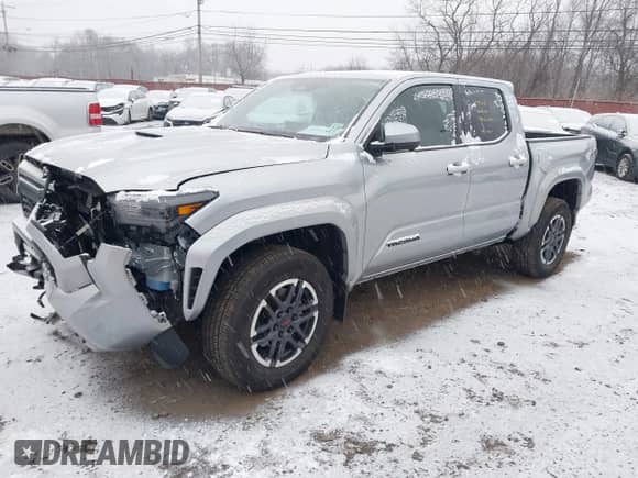 2024 Toyota Tacoma SR5 with VIN 3TMLB5JN6RM018639, listed as a IAAI auction lot 41251861 with 10,088 mi miles and . Bid and sale history available at DreamBid. Image 17.