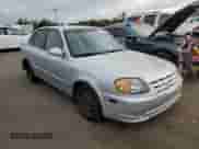 2005 Hyundai Accent GLS z VIN KMHCG45C45U631414, wystawiony jako Copart lot #73963814 z przebiegiem 106 617 mil mil oraz Szkoda całkowita • Salvage title. Historia ofert i sprzedaży dostępna na DreamBid. Obrazek 4.
