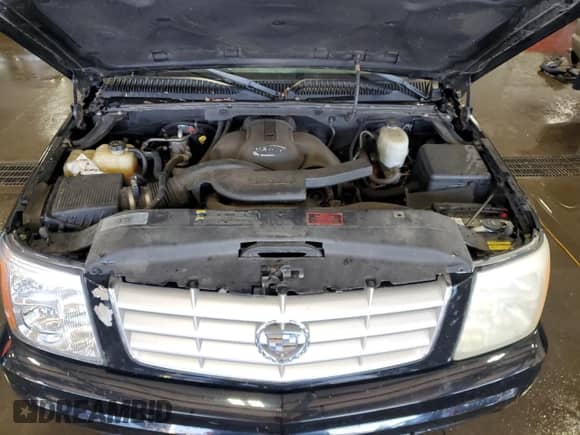 2004 Cadillac Escalade EXT with VIN 3GYEK62N64G298822, listed as a Copart auction lot 68871455 with 145,771 mi miles and Salvage title. Bid and sale history available at DreamBid. Image 11.