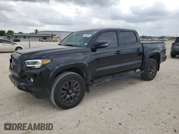 2023 Toyota Tacoma Limited с VIN 3TMEZ5CN5PM211086, выставлен на аукционе Copart как лот 54155355 с пробегом 22 886 миль миль и Списание • Salvage title. История ставок и продаж доступна на DreamBid. Изображение 1.