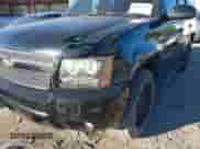 2007 Chevrolet Tahoe LTZ with VIN 1GNFK13027R249676, listed as a IAAI auction lot 43424132 with 296,751 mi miles and . Bid and sale history available at DreamBid. Image 6.