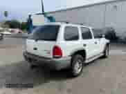 2003 Dodge Durango Sport with VIN 1D4HS38N83F514665, listed as a Copart auction lot 84069965 with 225,719 mi miles and Clean title. Bid and sale history available at DreamBid. Image 4.