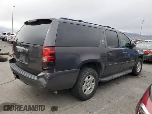 2011 Chevrolet Suburban LS с VIN 1GNSCHE06BR137070, выставлен на аукционе Copart как лот 48059975 с пробегом 264 581 миль миль и Чистый • Clean title. История ставок и продаж доступна на DreamBid. Изображение 3.