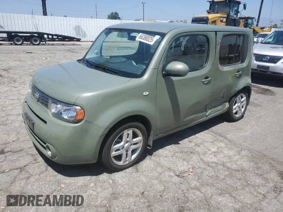 2010 Nissan Cube S Krom Edition with VIN JN8AZ2KR2AT170561, listed as a Copart auction lot 66388025 with 52,992 mi miles and Salvage title. Bid and sale history available at DreamBid. Image 1.