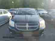 2009 Dodge Caliber SXT with VIN 1B3HB48A39D130816, listed as a Copart auction lot 82270345 with 106,380 mi miles and Salvage title. Bid and sale history available at DreamBid. Image 5.