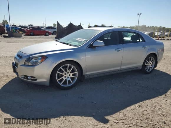 2012 Chevrolet Malibu LTZ 1LZ with VIN 1G1ZE5E0XCF254615, listed as a Copart auction lot 71444435 with 149,160 mi miles and Salvage title. Bid and sale history available at DreamBid. Image 1.