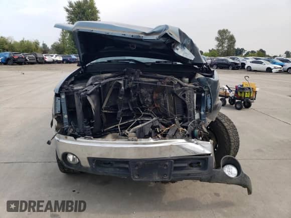 2007 GMC Sierra 1500 SLT с VIN 1GTEK19J37Z639755, выставлен на аукционе Copart как лот 69992525 с пробегом Не указан миль и Списание • Salvage title. История ставок и продаж доступна на DreamBid. Изображение 5.