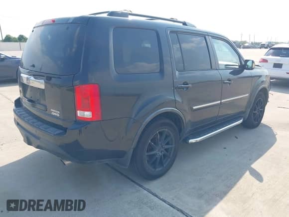 2012 Honda Pilot Touring with VIN 5FNYF4H93CB044933, listed as a IAAI auction lot 43249328 with 218,196 mi miles and . Bid and sale history available at DreamBid. Image 4.