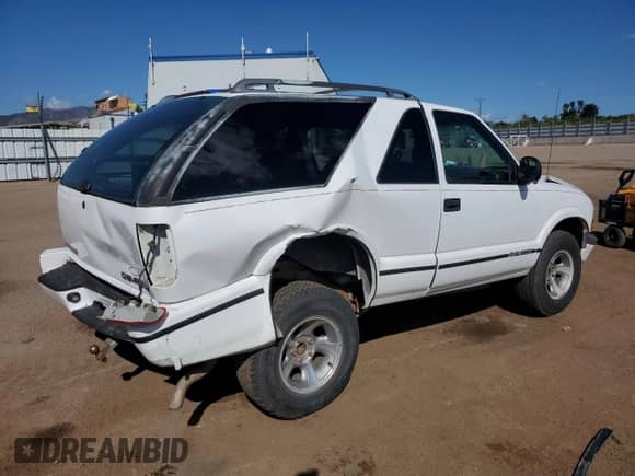 1998 Chevrolet Blazer LS with VIN 1GNCS18W7WK173069, listed as a Copart auction lot 71709615 with 193,734 mi miles and Salvage title. Bid and sale history available at DreamBid. Image 3.